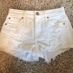 adorable white distressed shorts!
